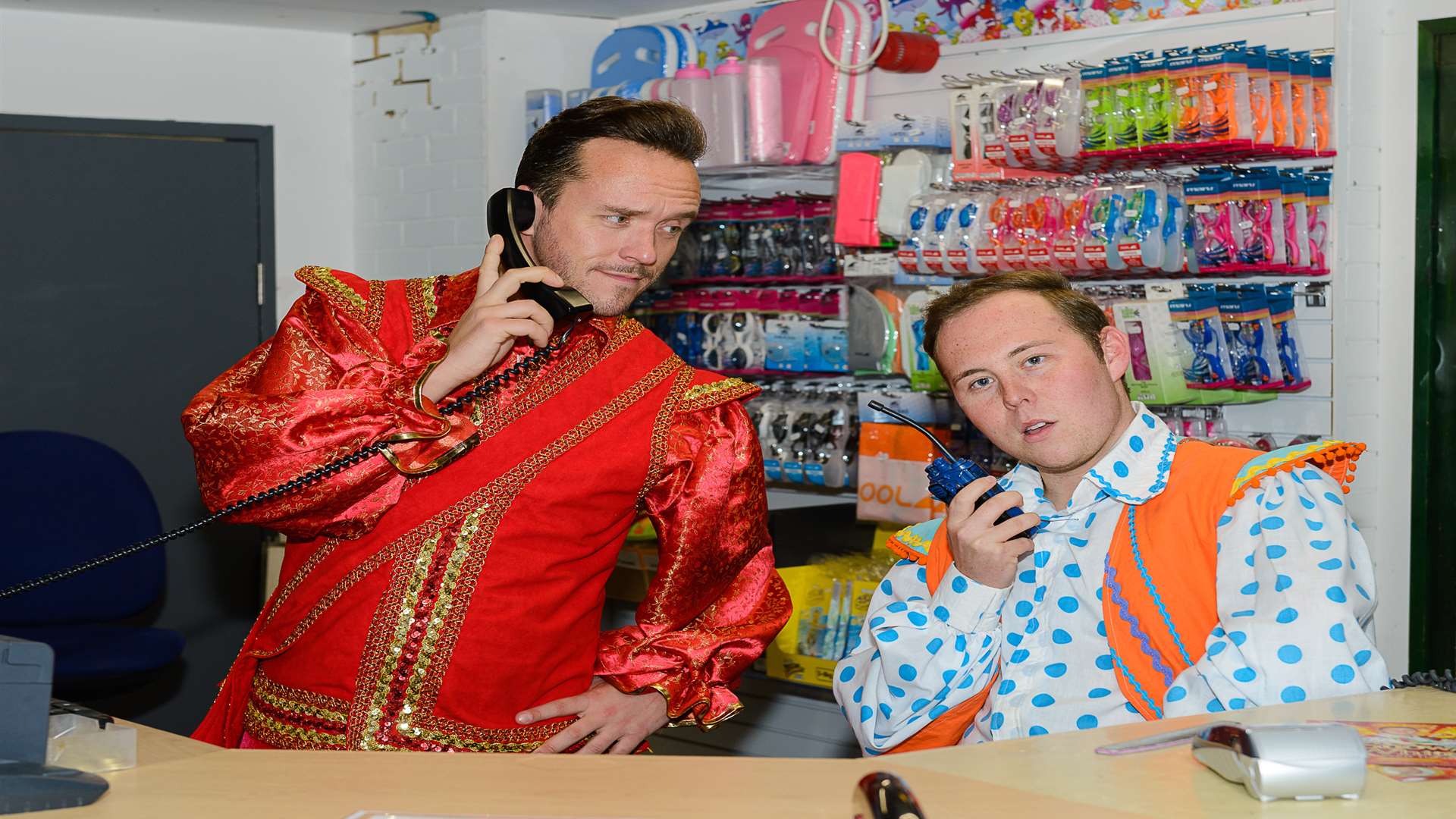 Actors Joshua Pascoe and Robert Brendan as Muddles and Prince Lorenzo, taking charge of reception duties at Swallows Leisure Centre