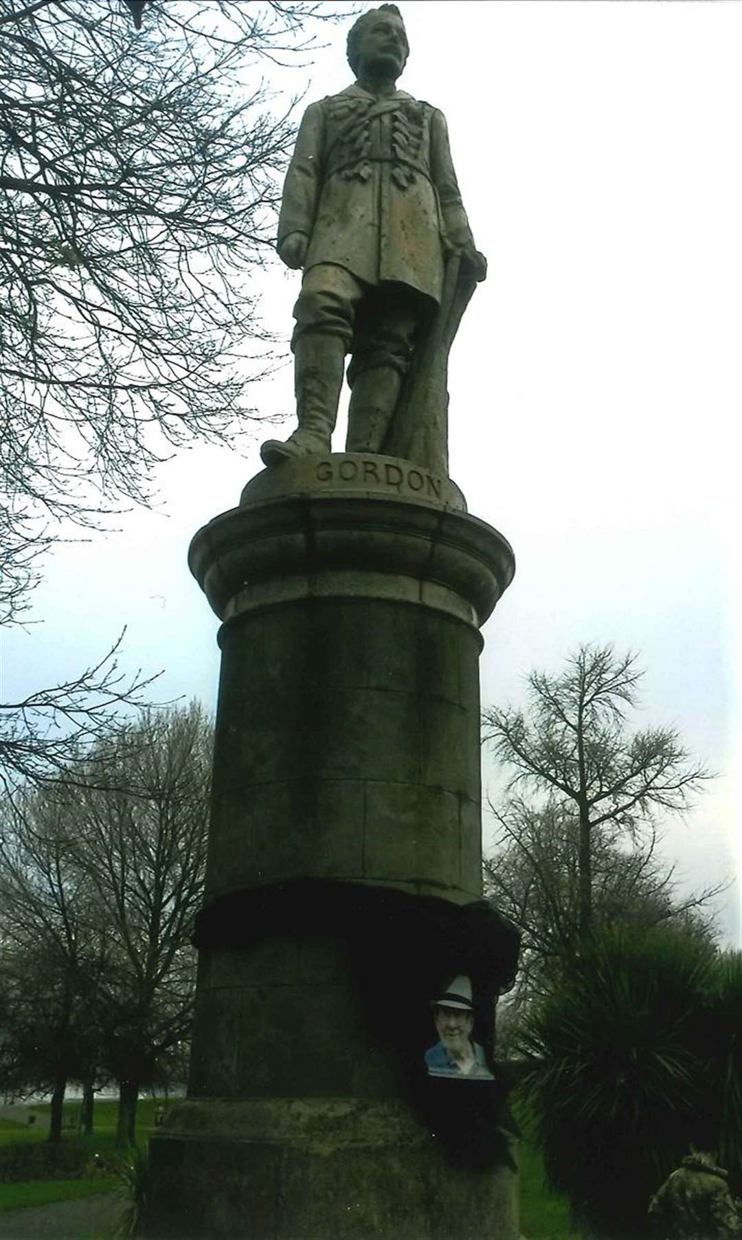 The statue of Major-General Charles George Gordon in the Gordon Gardens with a photo of one of his great admirers, historian Tony Larkin