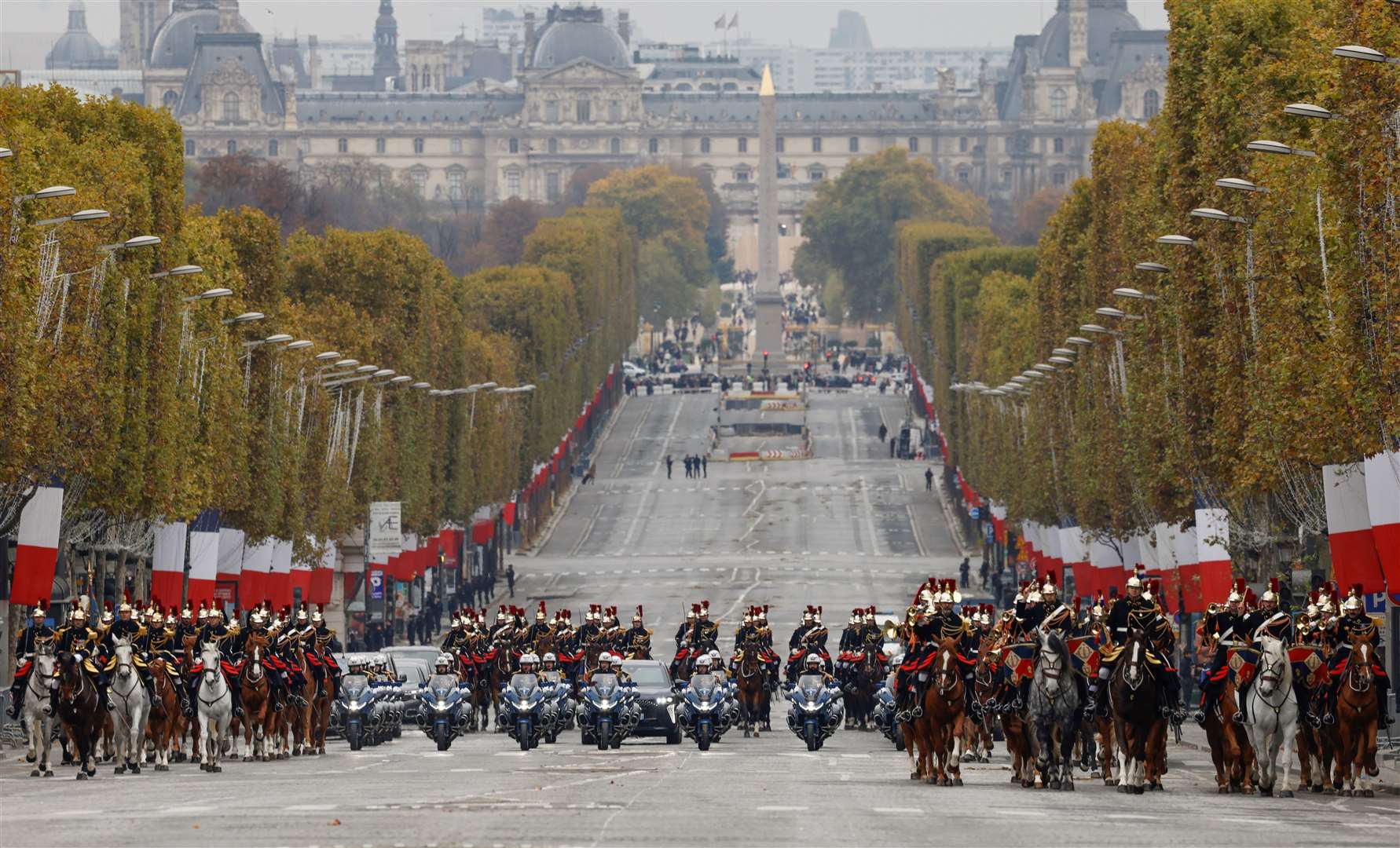 Republican Guards at the Champs-Elysees avenue in Paris (Ludovic Marin, Pool via AP)