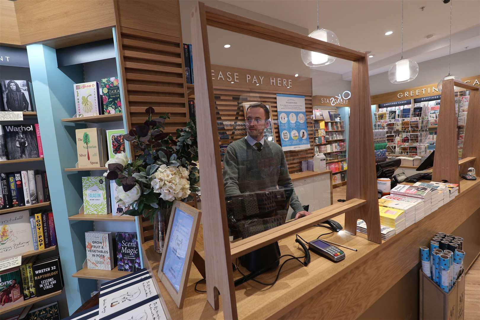 Plexiglass screens have been installed in a London branch of Waterstones (Yui Mok/PA)