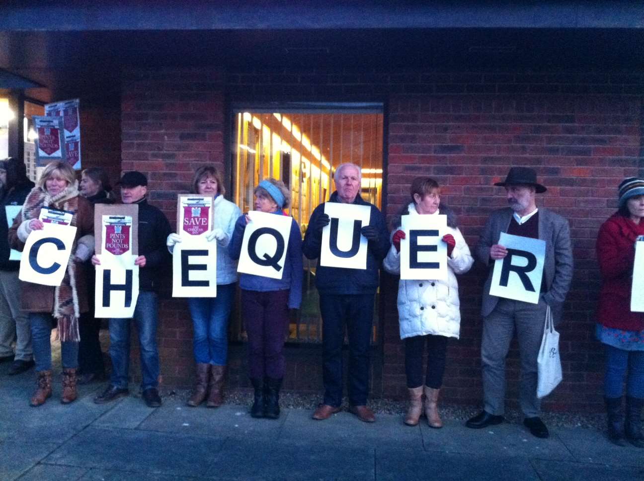 Supporters standing outside council offices