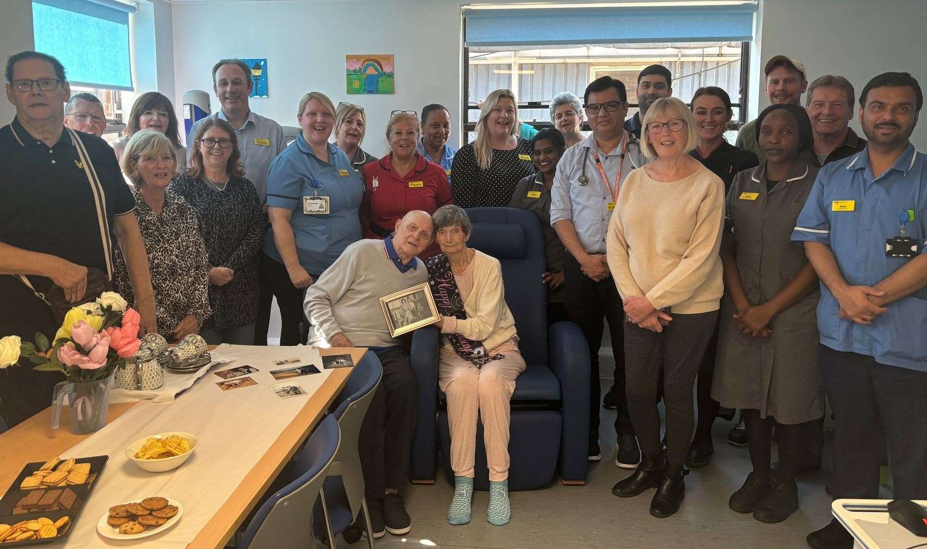 Staff put on a surprise tea party for the couple. Picture: NHS