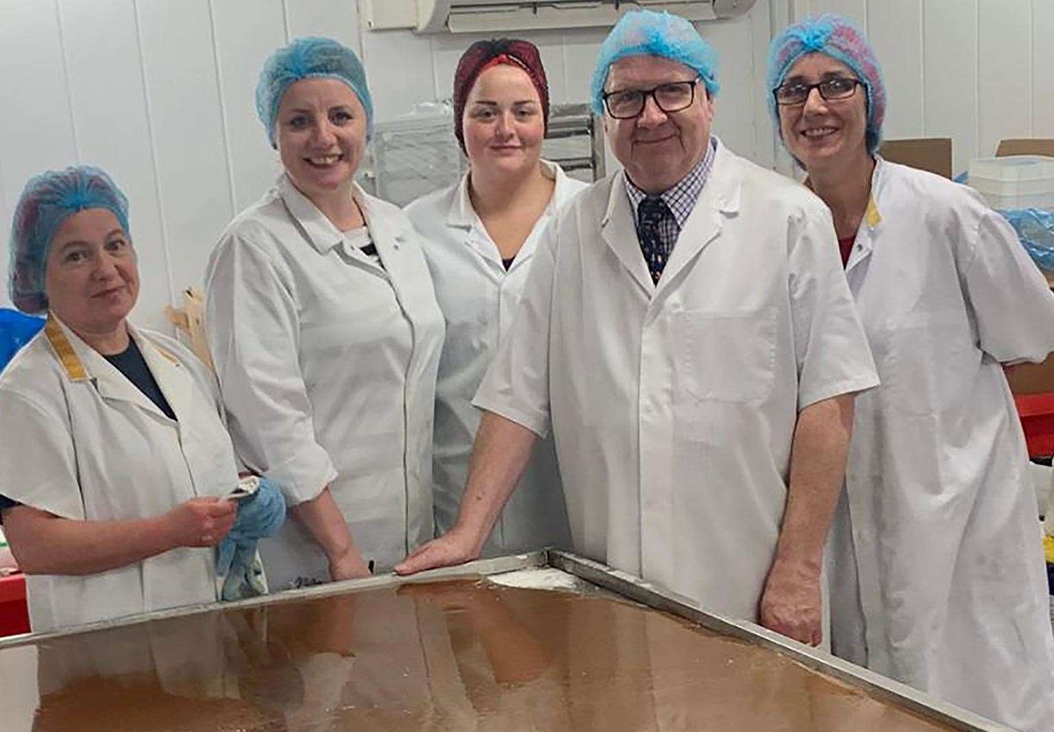 Derek Shaw with the team of Mackie's staff - Deirdre Henderson, Pauline Taylor, Angela Grubb and Louise Hunter - at the factory in Aberdeenshire taken before the Covid-19 pandemic. Picture: Mackie's of Scotland
