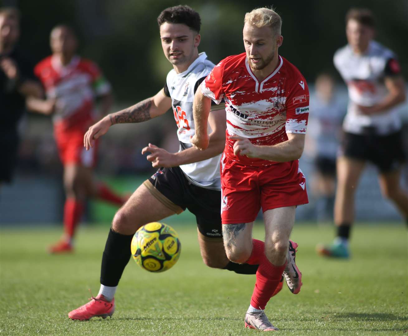 Ramsgate's Alfie Paxman in the thick of the action in their 4-2 Isthmian South East derby victory at Deal on Bank Holiday Monday. Picture: Paul Willmott