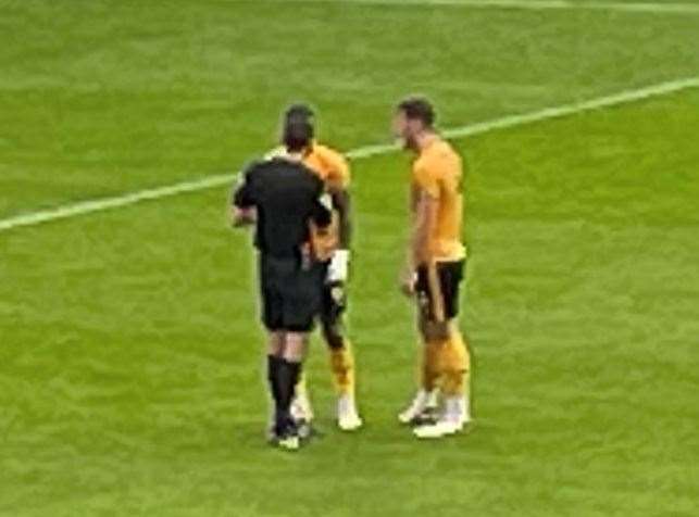 Striker Omar Bogle could be seen talking to referee Tom Reeves