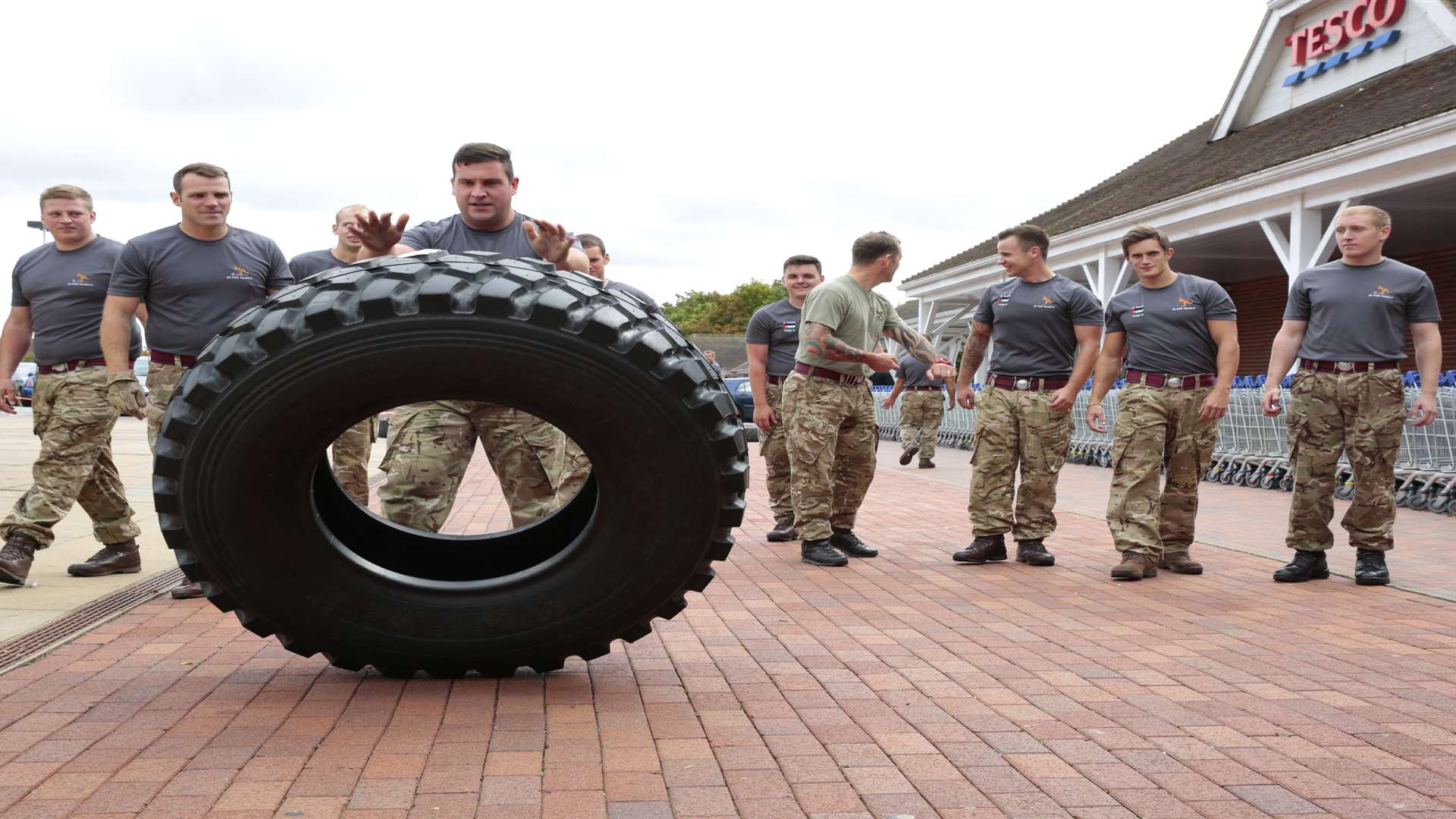 Chris Cooper takes his turn in the 24-hour tyre flip. Picture: Martin Apps