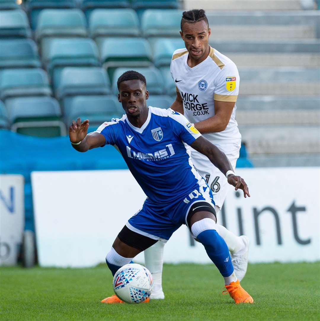 Rhys Bennett in action for Peterborough United against the Gills