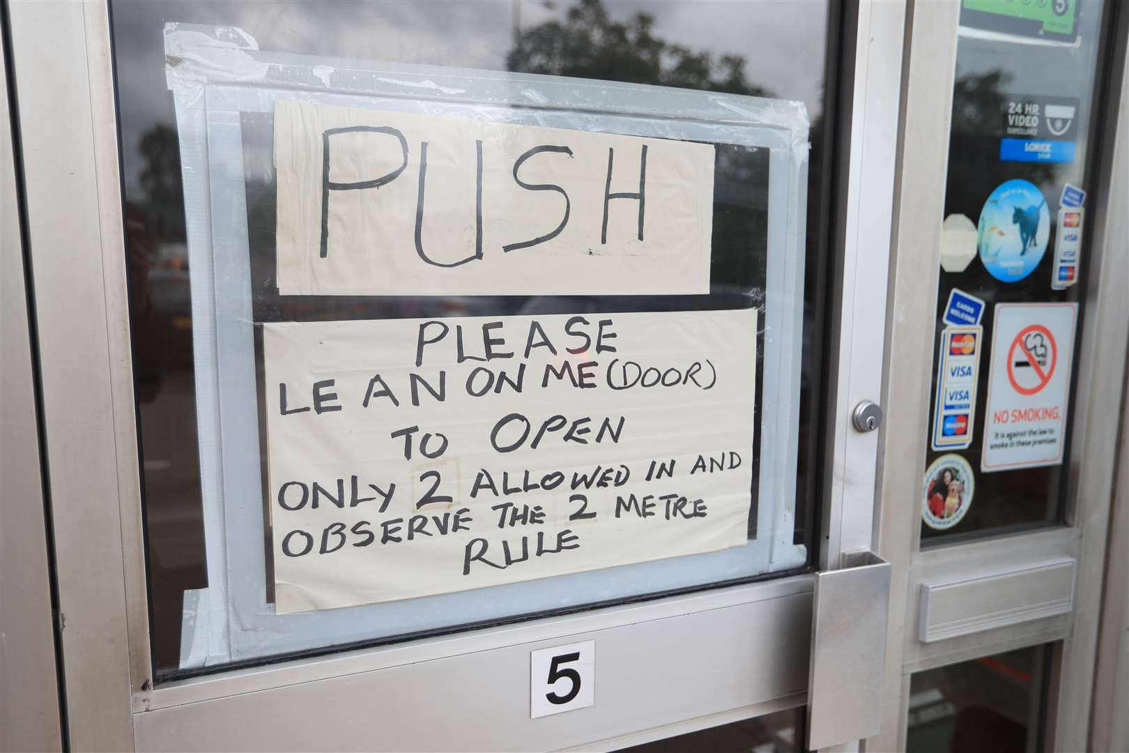 A sign in a shop window in Leicester (Joe Giddens/PA)