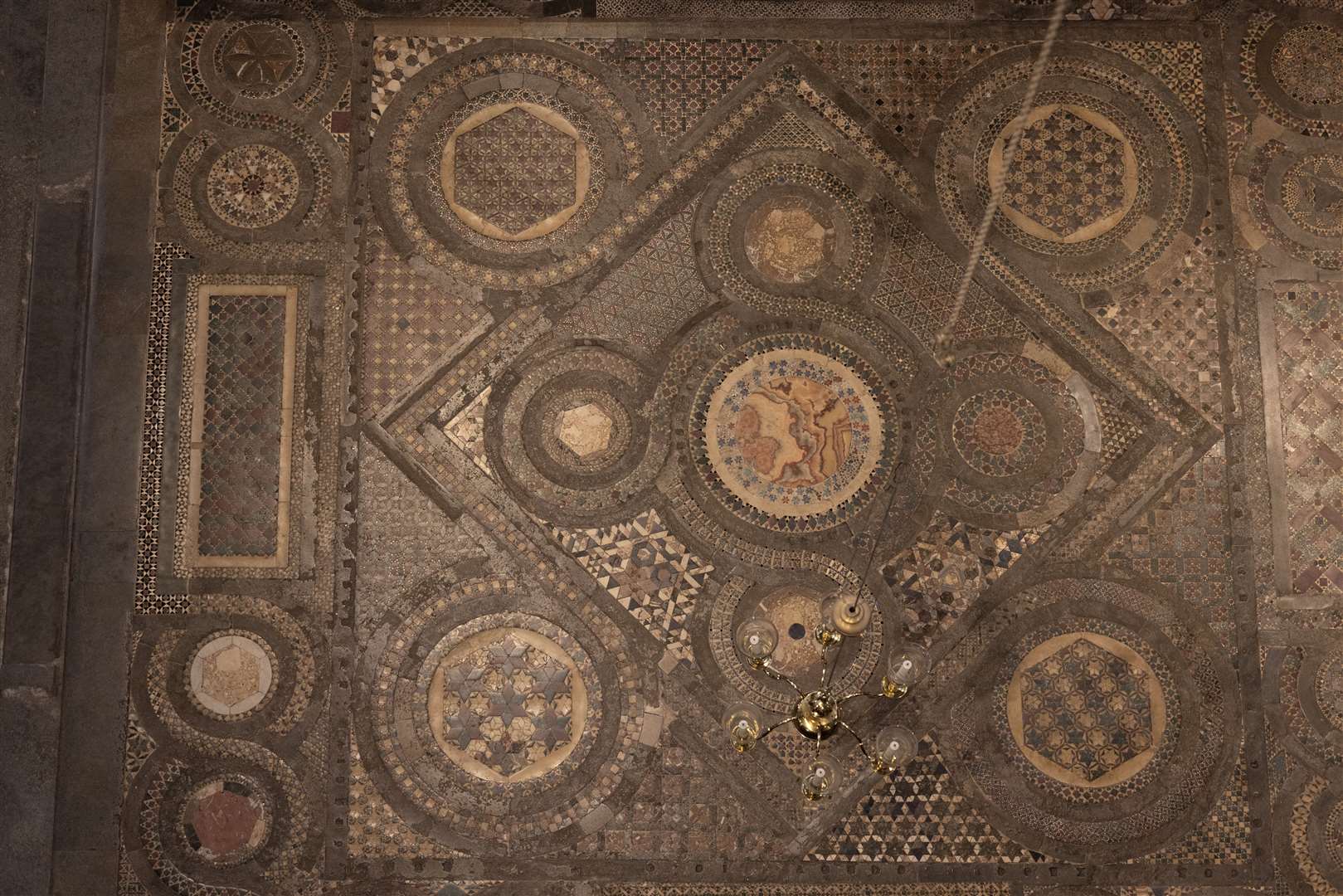 The Cosmati pavement, a mosaic containing marble, stone, glass and metal that dates to the 13th century is seen inside Westminster Abbey in London, ahead of the coronation (Dan Kitwood/PA)