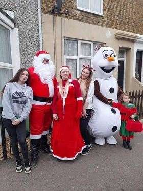 Natasha and her helpers spreading festive cheer