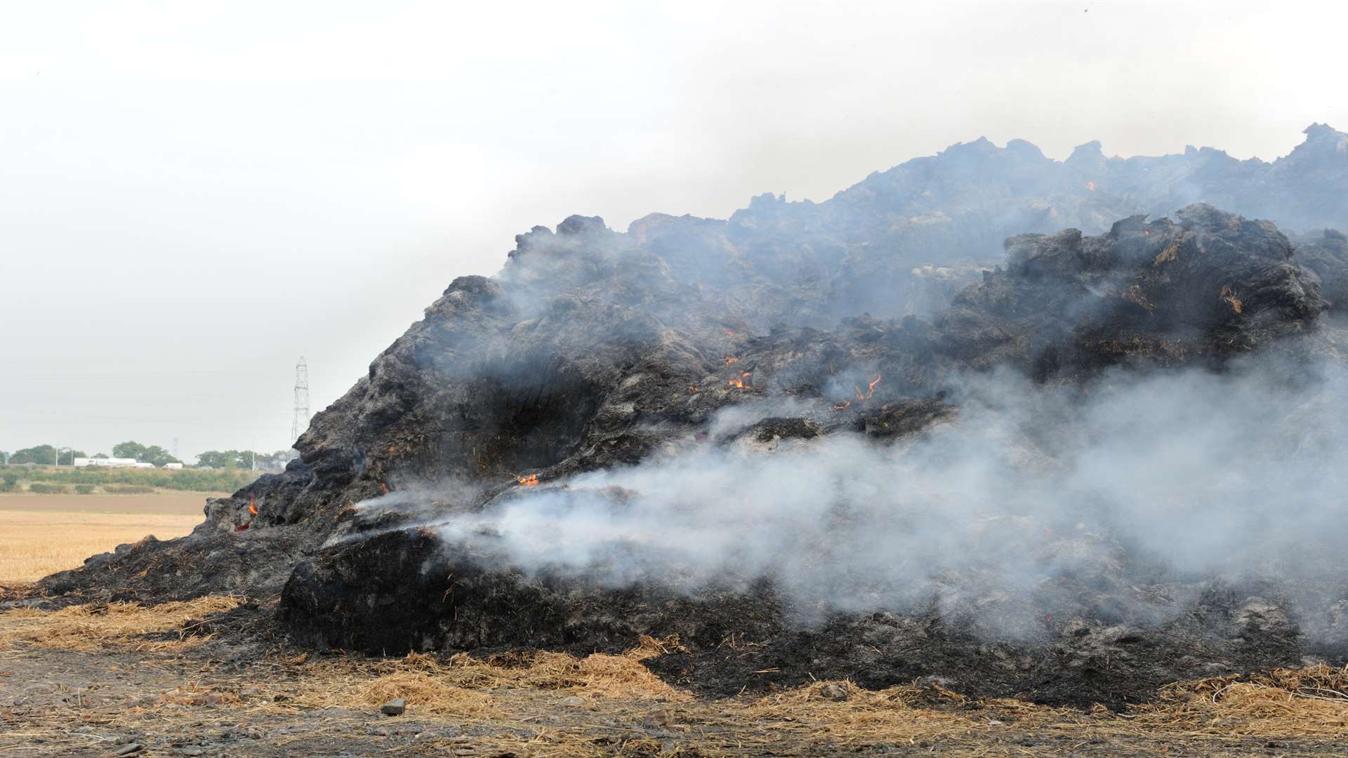 Around 400 bales of hay were engulfed in flames