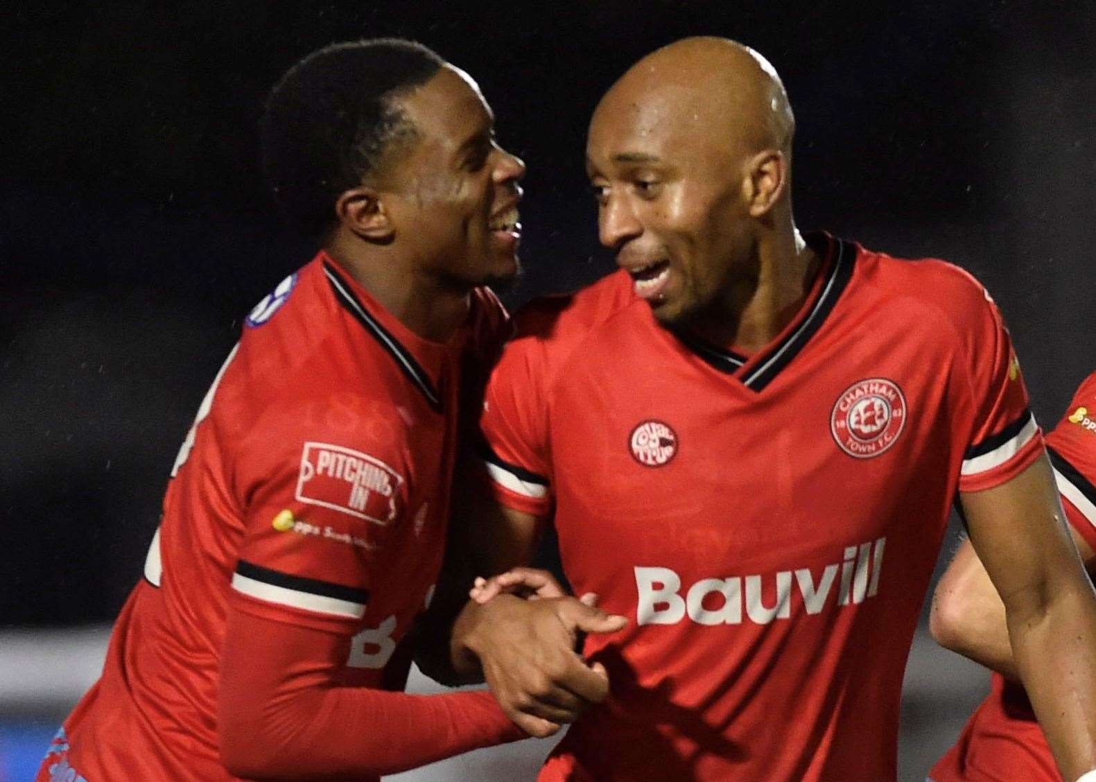 Chatham’s John Ufuah (right) is all smiles after scoring a late brace against Whitehawk. Picture: Ian Scammell