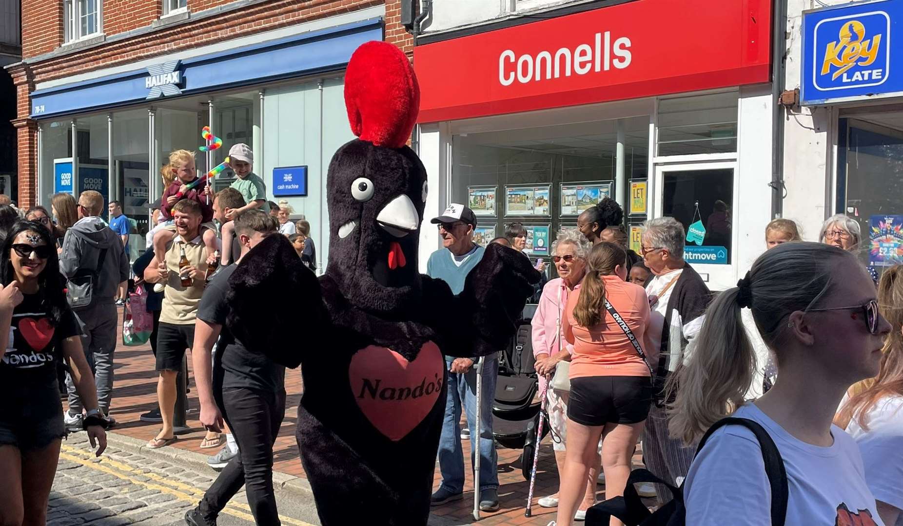 Plenty of people - and mascots for fastfood restaurants - joined the parade on foot. Picture: Joe Crossley