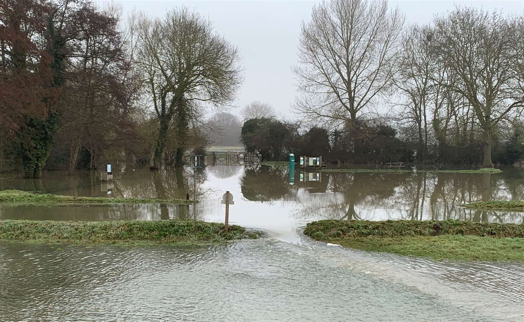 And this road, past Cookham Moor, was closed after the Thames burst its banks near the Berkshire village (Pete Clifton/PA)