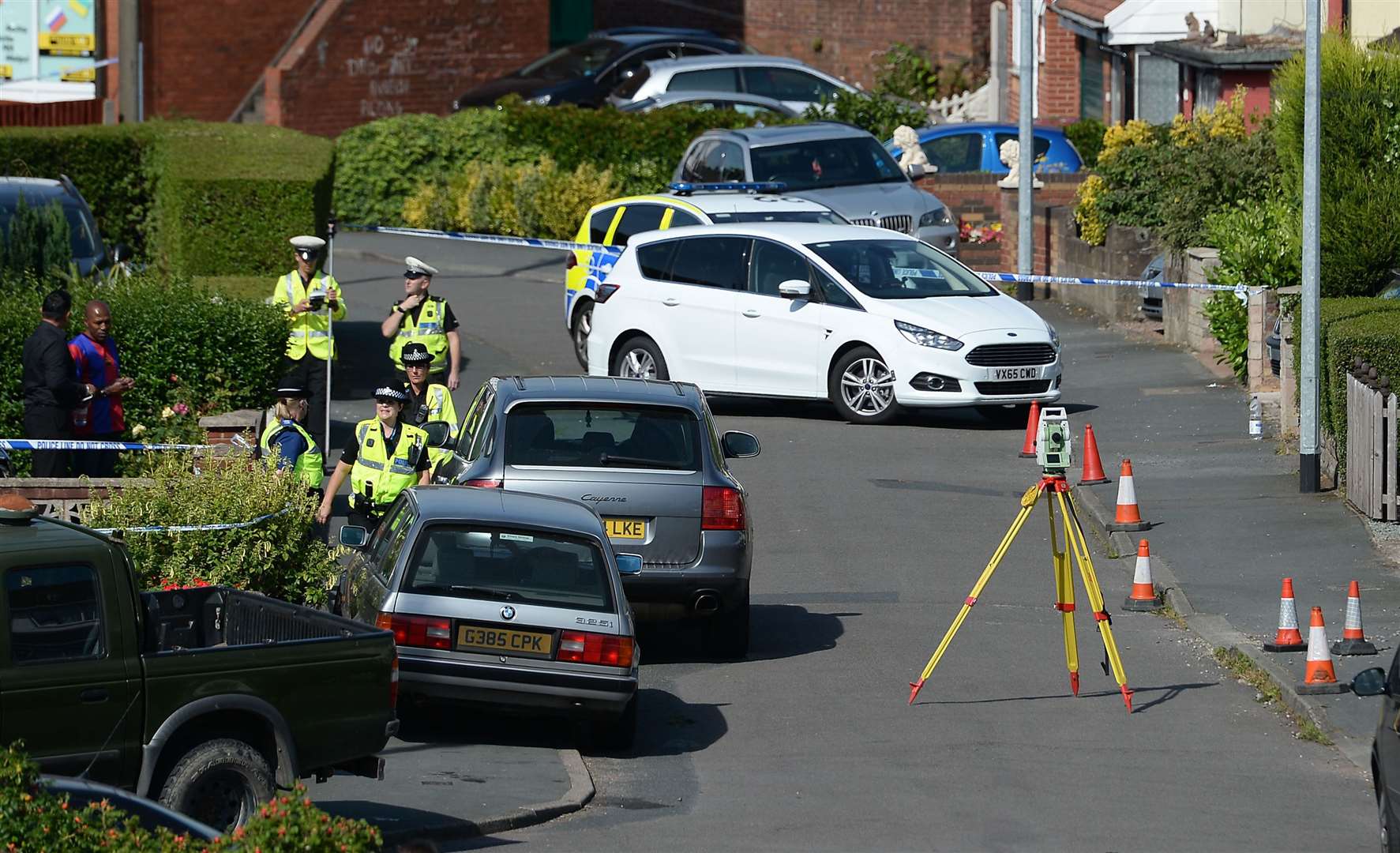 Police near the scene of the alleged murder (Joe Giddens/PA)