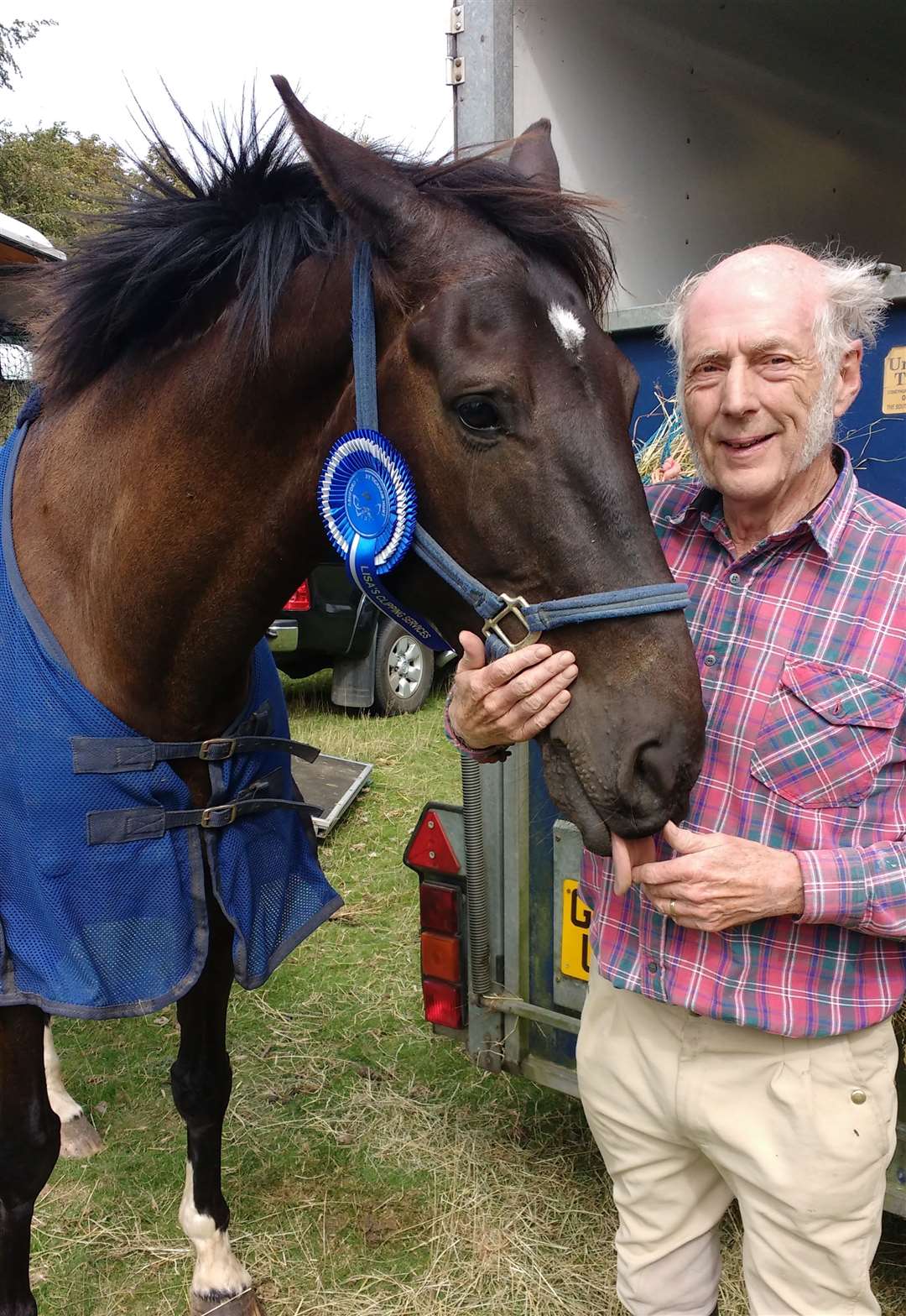 Mr Harrison alongside one of his two horses, Morrie. Picture: Phil Harrison