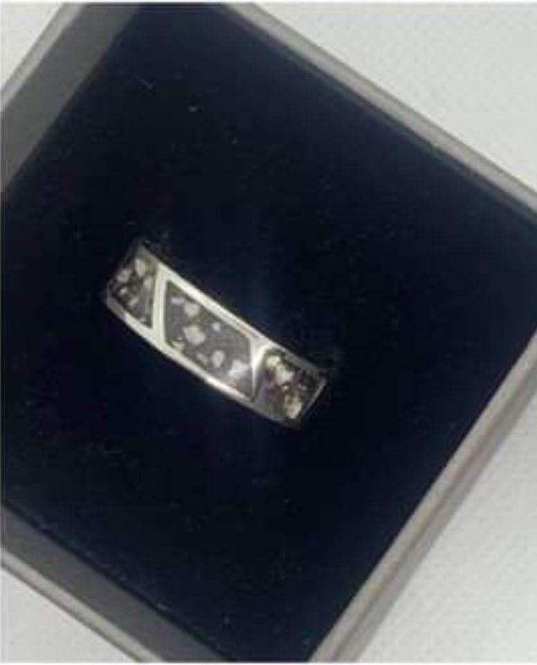 The ring is black and silver with grey flecks