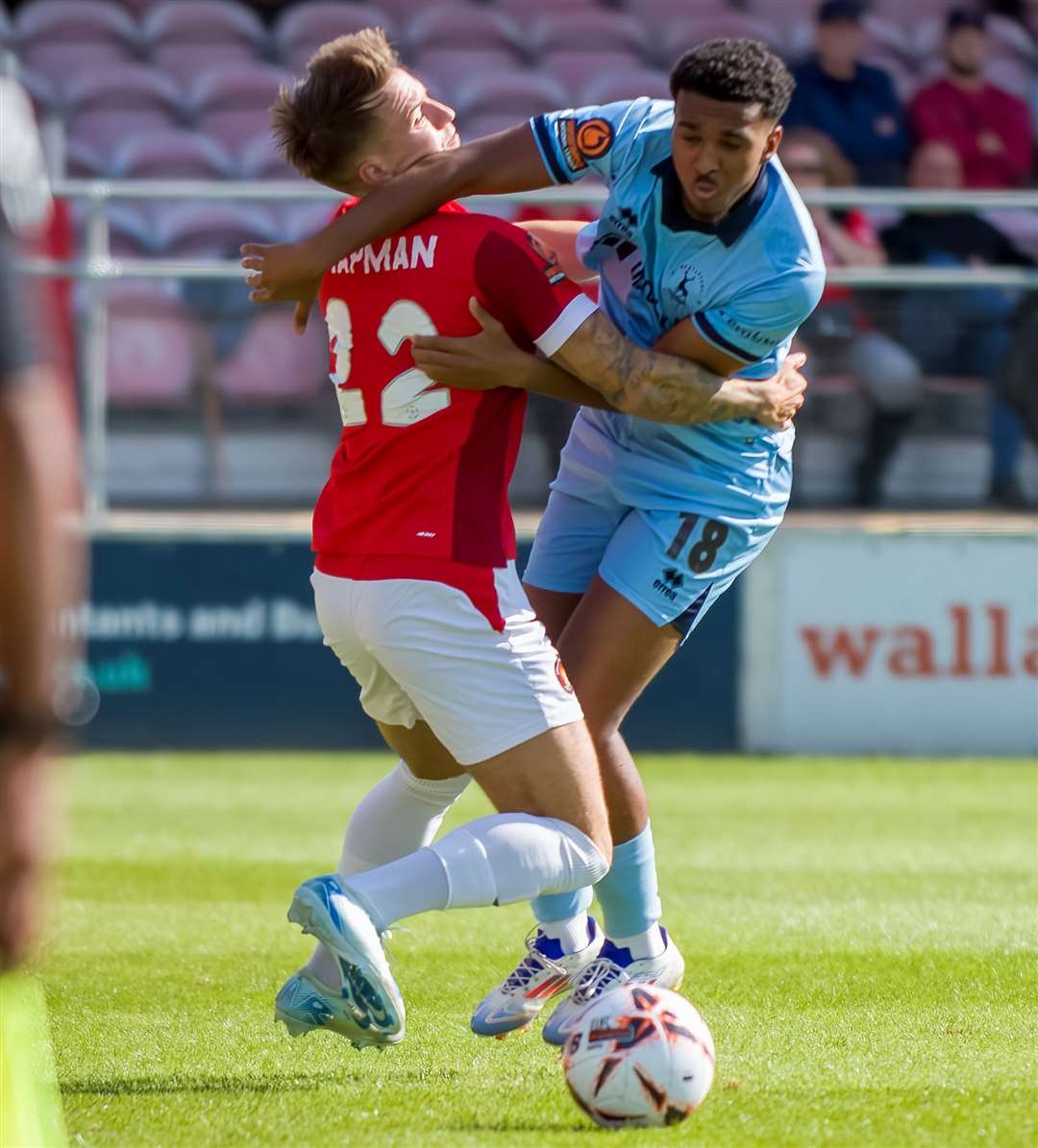 Ebbsfleet's Ben Chapman, left, is stopped in his tracks during the 1-0 victory against Hartlepool on Saturday. Picture: Ed Miller/EUFC