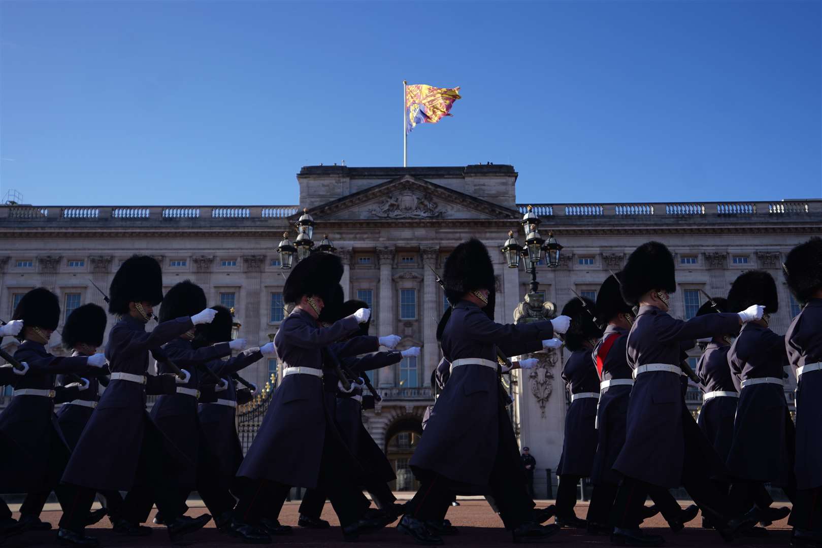 The King’s Guard march outside Buckingham Palace (James Manning/PA)