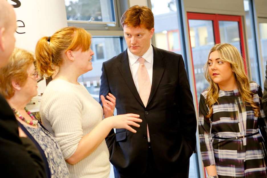 Treasury Minister Danny Alexander talks to apprentice's Tamzin Barrett and Hannah Gibbs