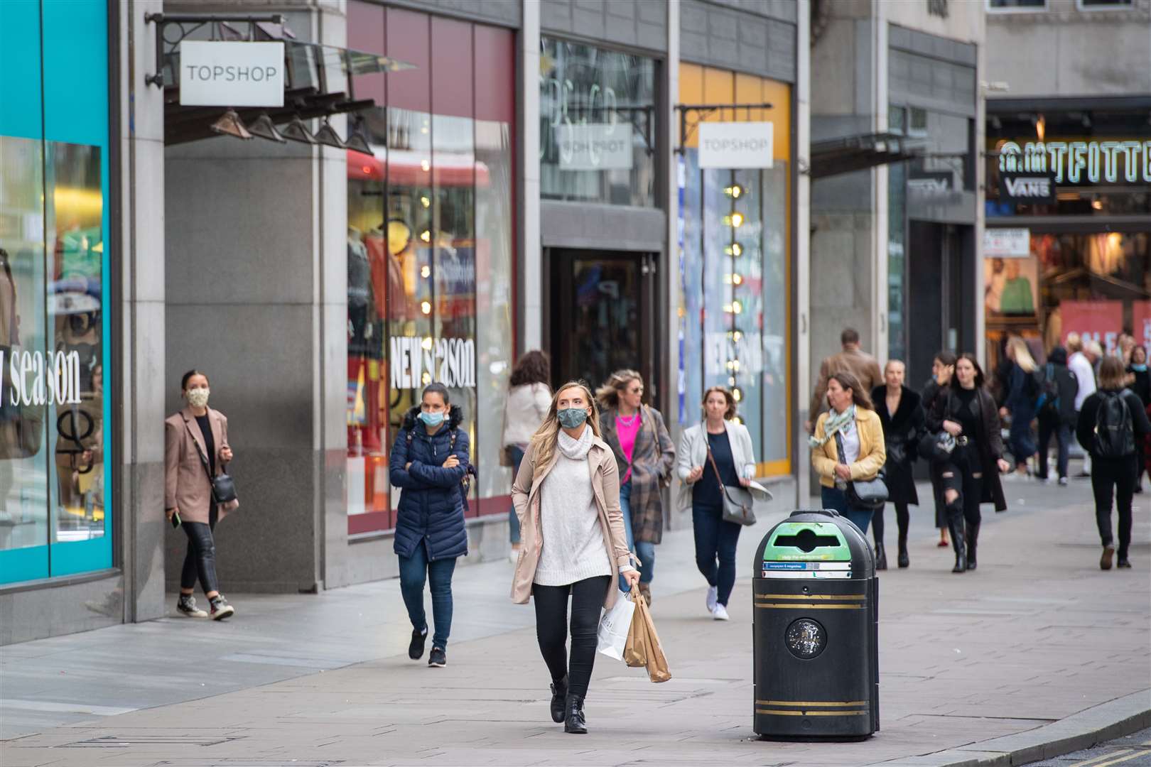 Shoppers on Oxford Street, London, in September 2020. Consumers began Christmas shopping earlier in 2020 and spruced up their homes, according to a OnePoll survey (Dominic Lipinski/PA)