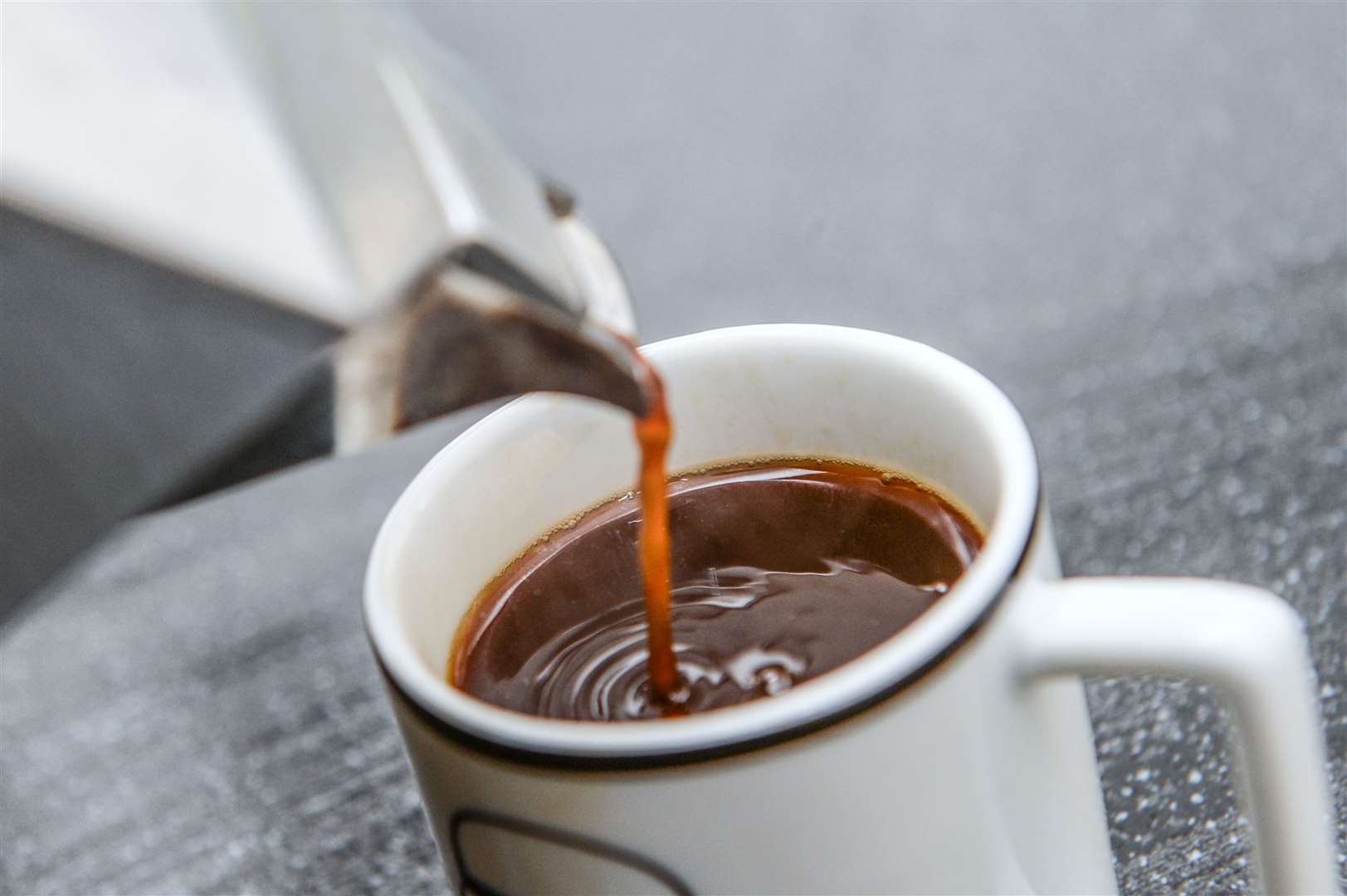 Coffee is poured from a stovetop espresso coffee maker (Anthony Devlin/PA)