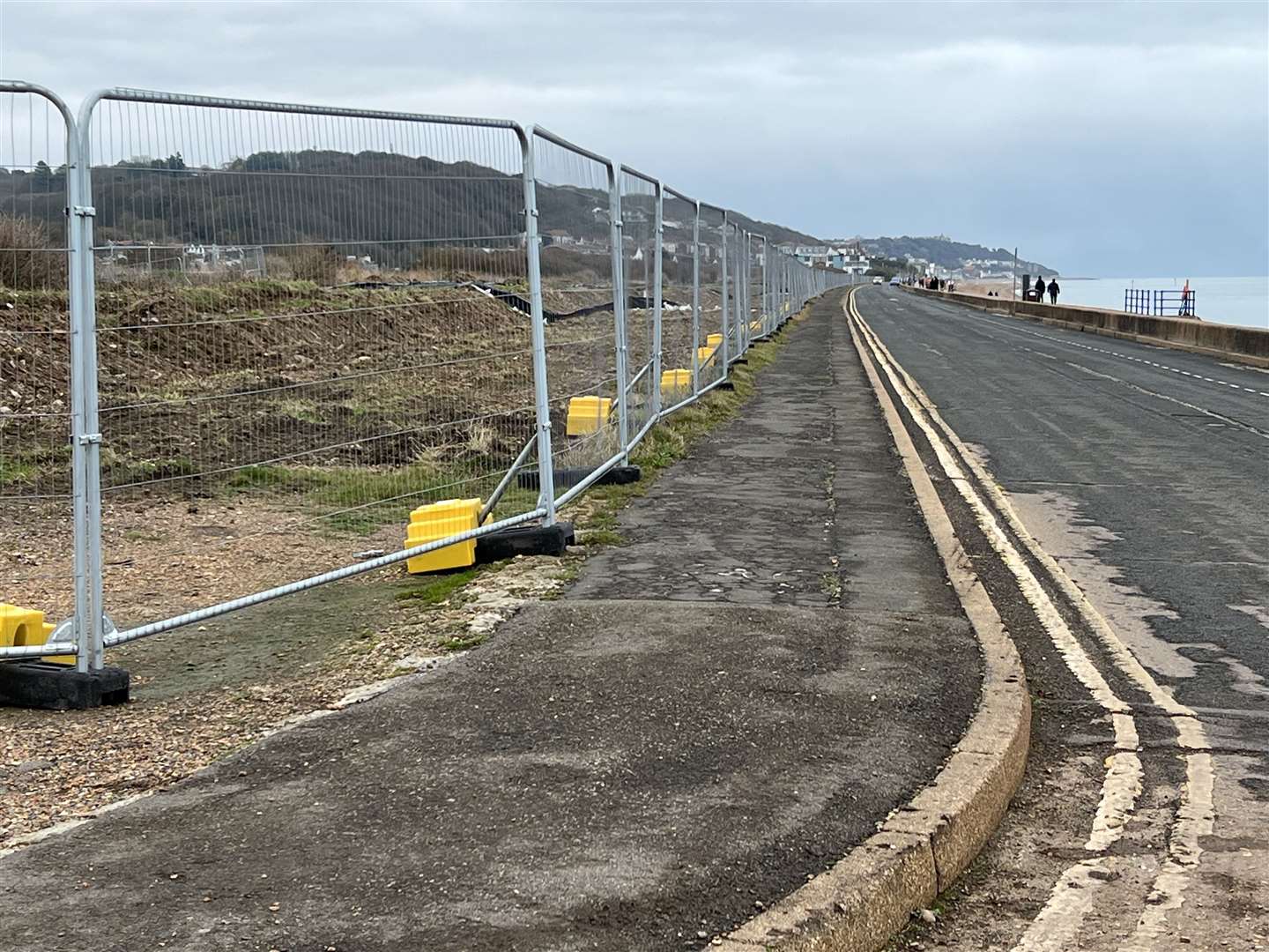 Fencing has gone up around parts of Princes Parade in Hythe where the new development is set to be built. Picture: Barry Goodwin