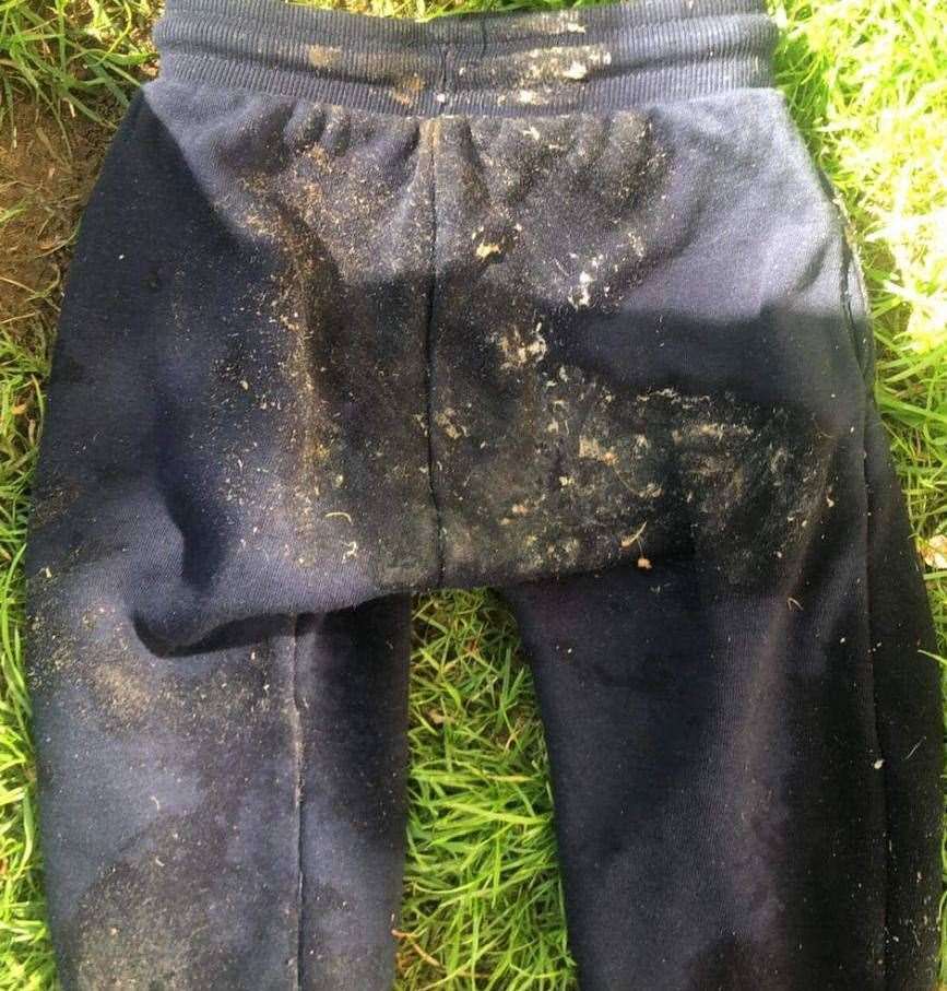 Theo's clothes were left covered in sewage. Picture: Amy Blyth