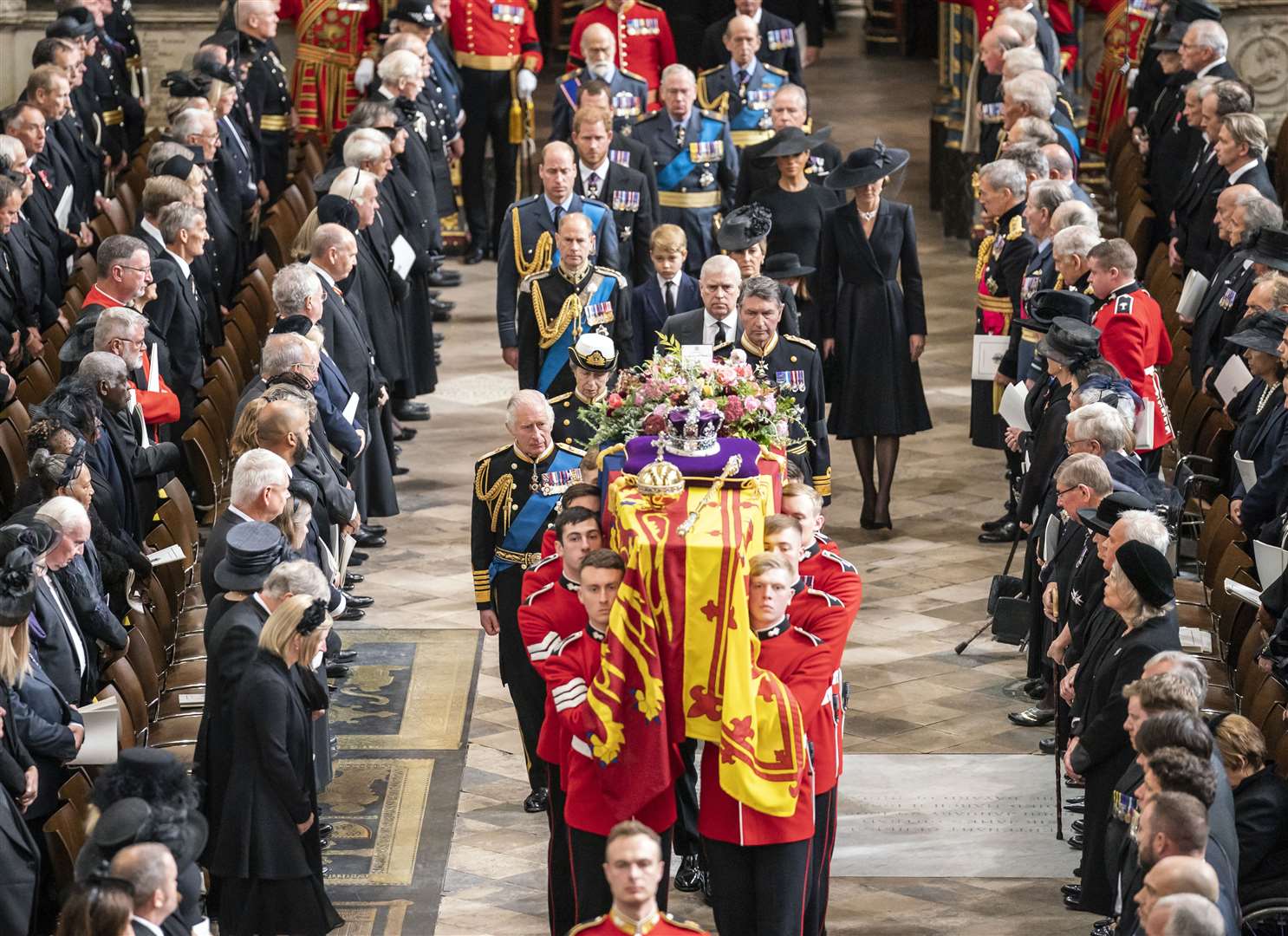 Charles leads mourners behind the Queen’s coffin (Danny Lawson/PA)