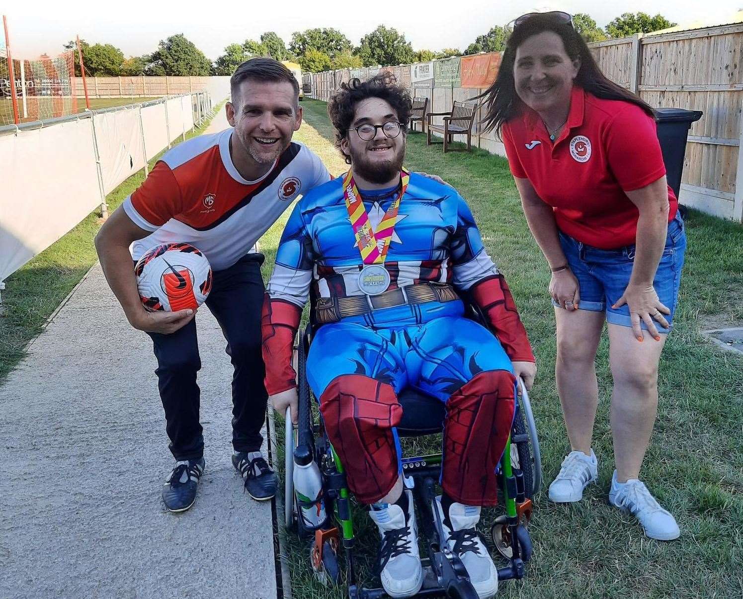 Owen West flanked by first team manager Paul Atkins and club chairman Nicola Stonebridge