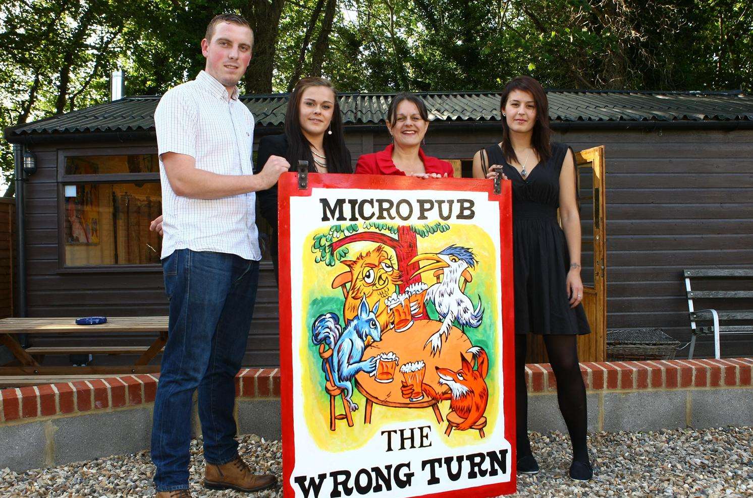 Ginny Timm, (third left) opens her own micro pub in Pie Factory Road, Barfreston this weekend. Pictured with daughters Emily and Victoria and son-in-law Jamie Kemp