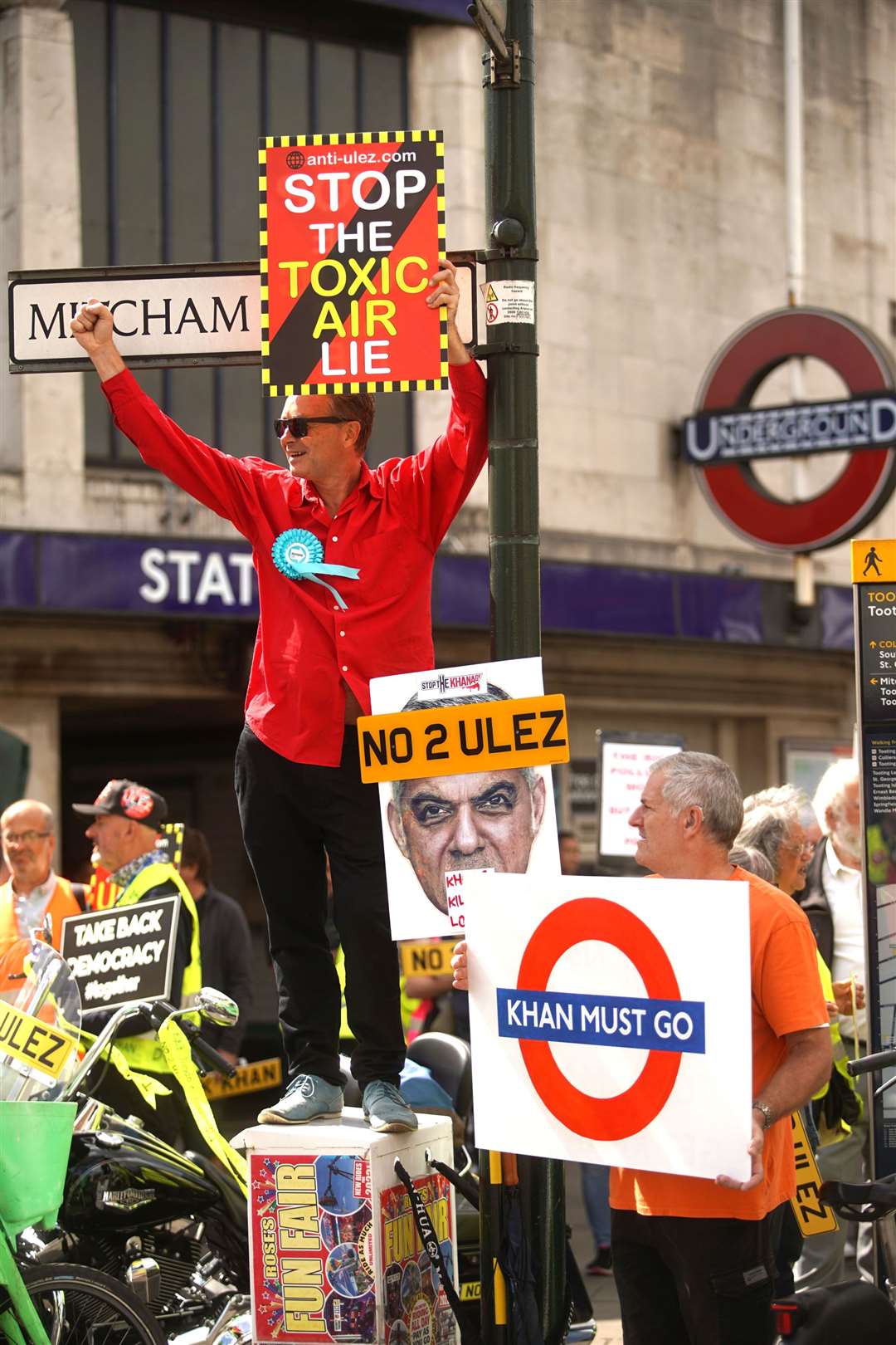 People take part in a protest against the proposed ultra-low emission zone (Ulez) expansion in Tooting, London (PA)