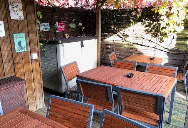 Parts of the seating area at the back of the pub are covered and there was also an outdoor TV screen