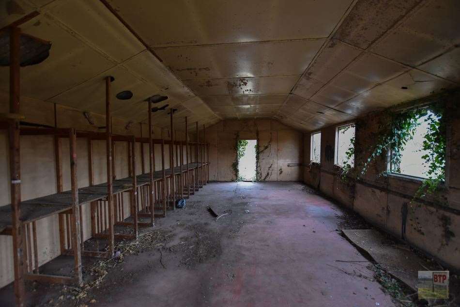 Inside one of the old decaying buildings where fireworks were once assembled. Photo: Beyond The Point (20798574)