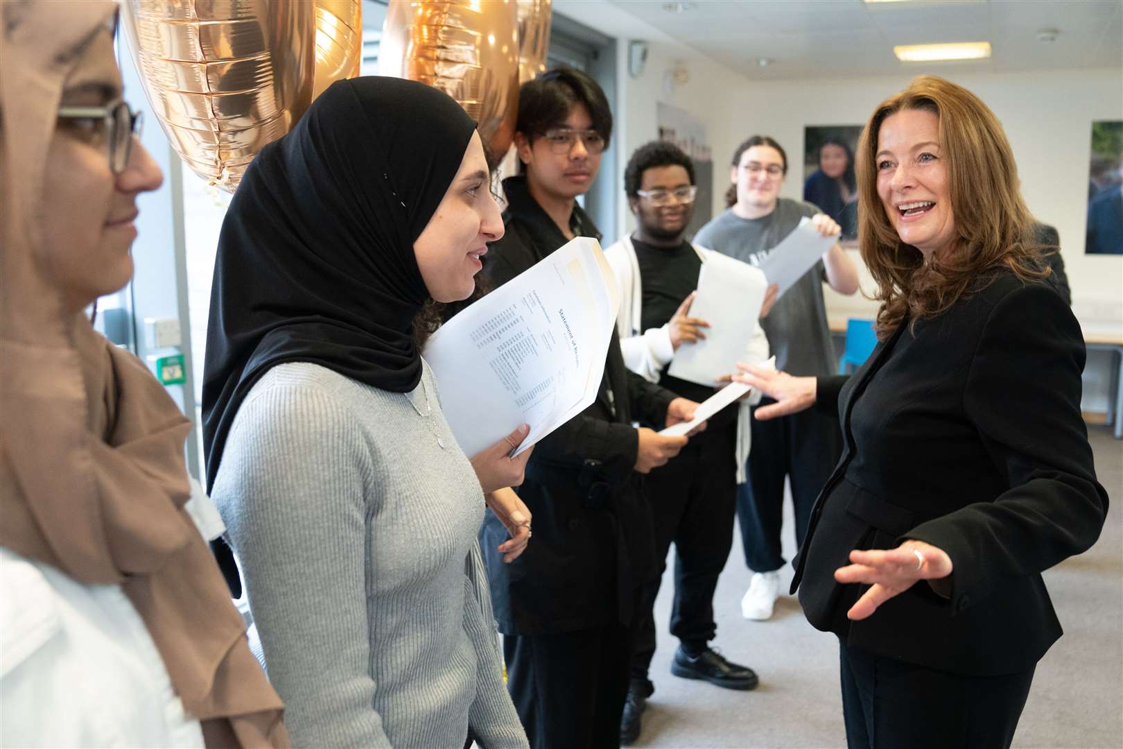 Education Secretary Gillian Keegan met pupils as they opened their GCSE results at Paddington Academy in London on Thursday (Stefan Rousseau/PA)