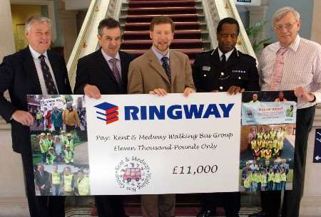 LEFT TO RIGHT: KM president Edwin Boorman, Jerry Pert of Ringway, Walking Bus charity chairman Simon Dolby, Chief Constable Mike Fuller and Keith Ferrin of KCC Highways. Picture: MATTHEW WALKER
