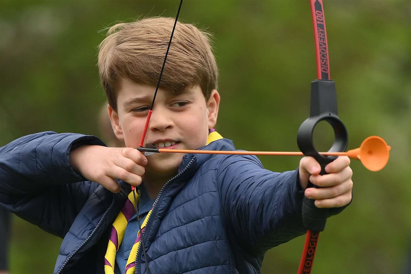 Prince George tries archery while joining volunteers as part of the Big Help Out (Daniel Leal/PA)