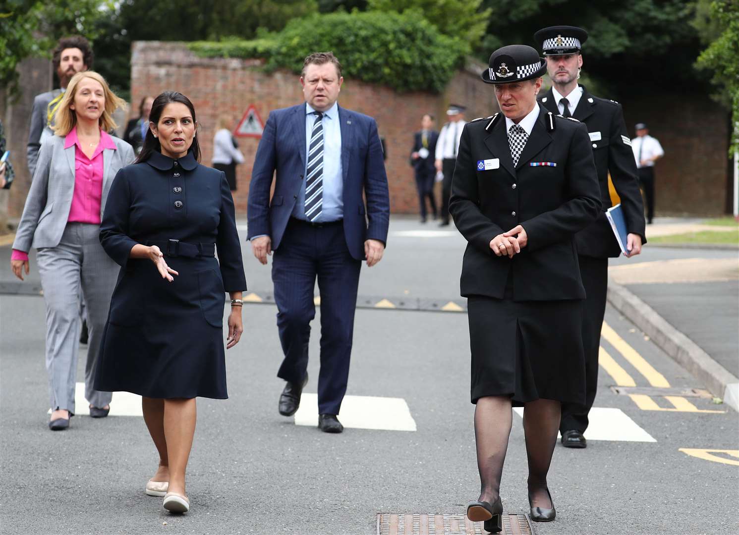 Home Secretary Priti Patel (second left) with Chief Constable of Sussex Police Jo Shiner (right) during a visit to Sussex Police Headquarters (Gareth Fuller/PA)