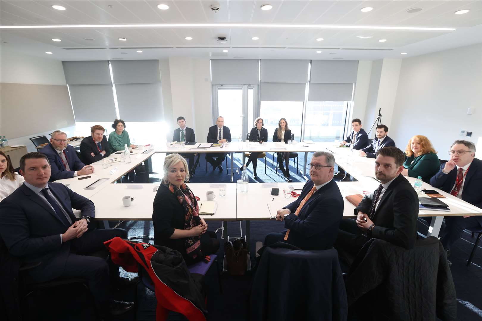 Northern Ireland Secretary Chris Heaton-Harris (back table middle left) with Doug Beattie MLA, leader of the UUP (third from left), Matthew O’Toole MLA, SDLP leader at Stormont (fourth from left), Sinn Fein vice president Michelle O’Neill (front left), Sir Jeffrey Donaldson MP, leader of the DUP (front right), and Naomi Long MLA and leader of the Alliance Party of NI (second from right), ahead of a meeting at Erskine House, Belfast (Liam McBurney/PA)