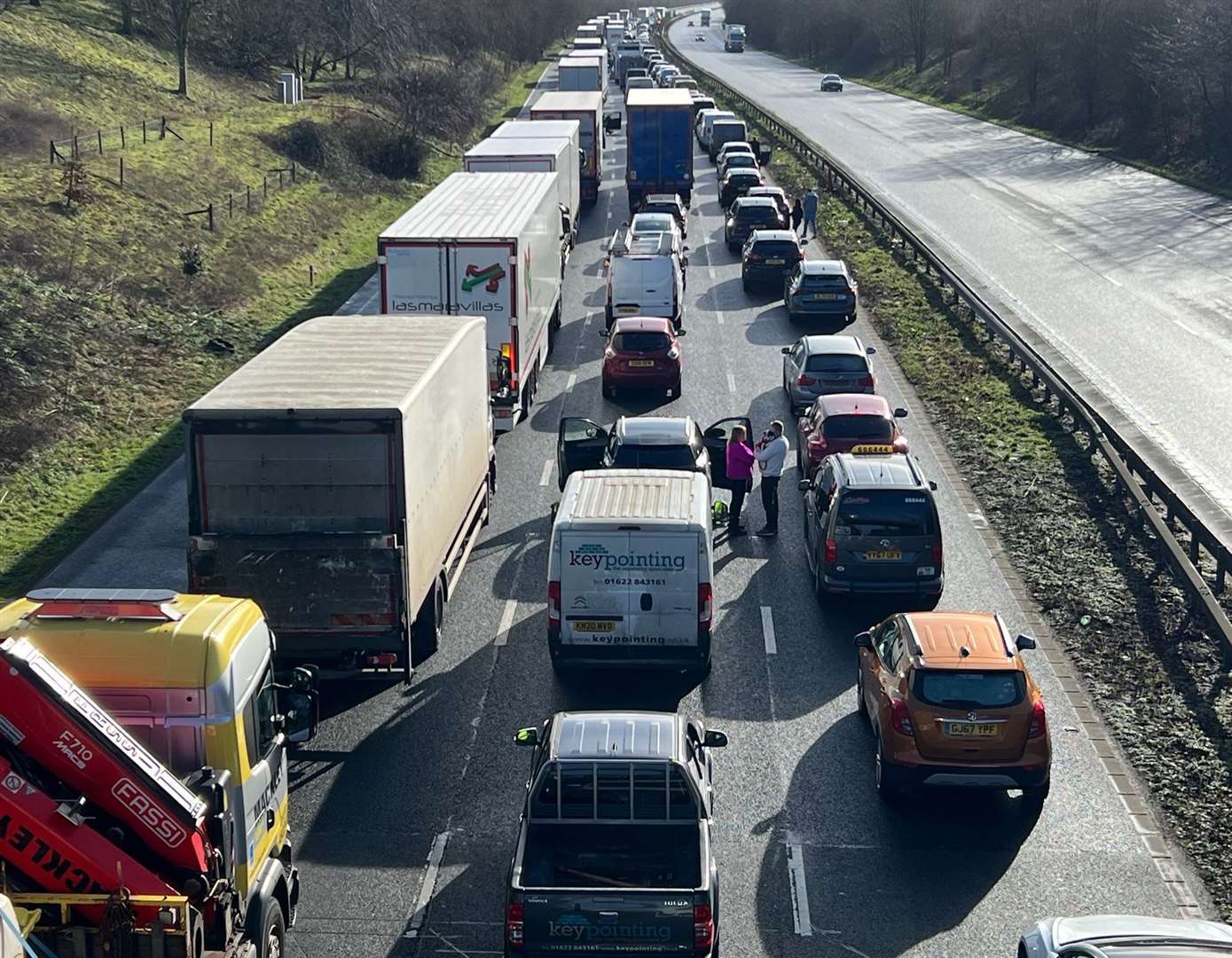 Traffic was held on the M20; this photo was taken on the bridge by Evegate Business Park in Smeeth. Picture: Barry Goodwin
