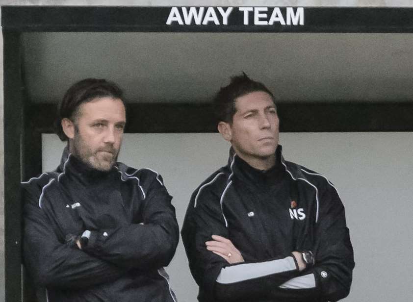 Maidstone boss Jay Saunders and No.2 Nicky Southall in the away dugout at Princes Park Picture: Andy Payton