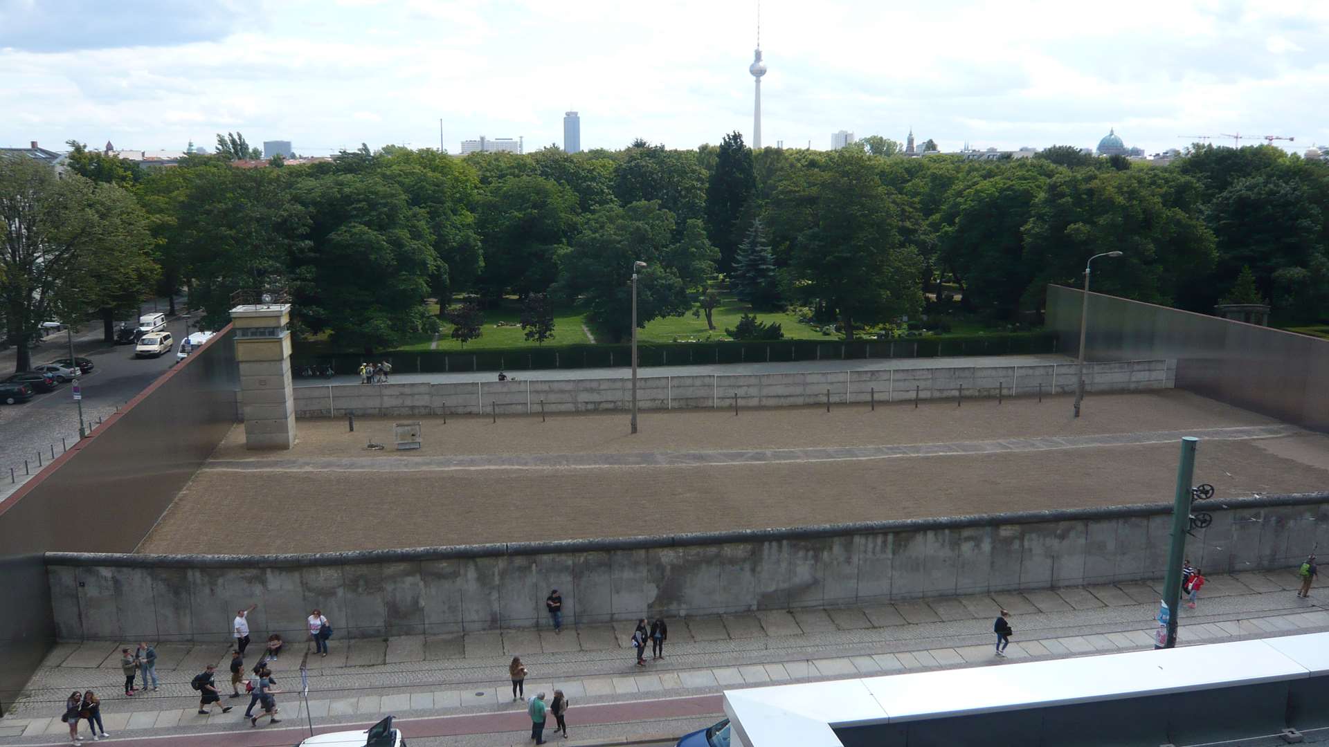 The preserved wall and watchtower at Bernauer Strasse