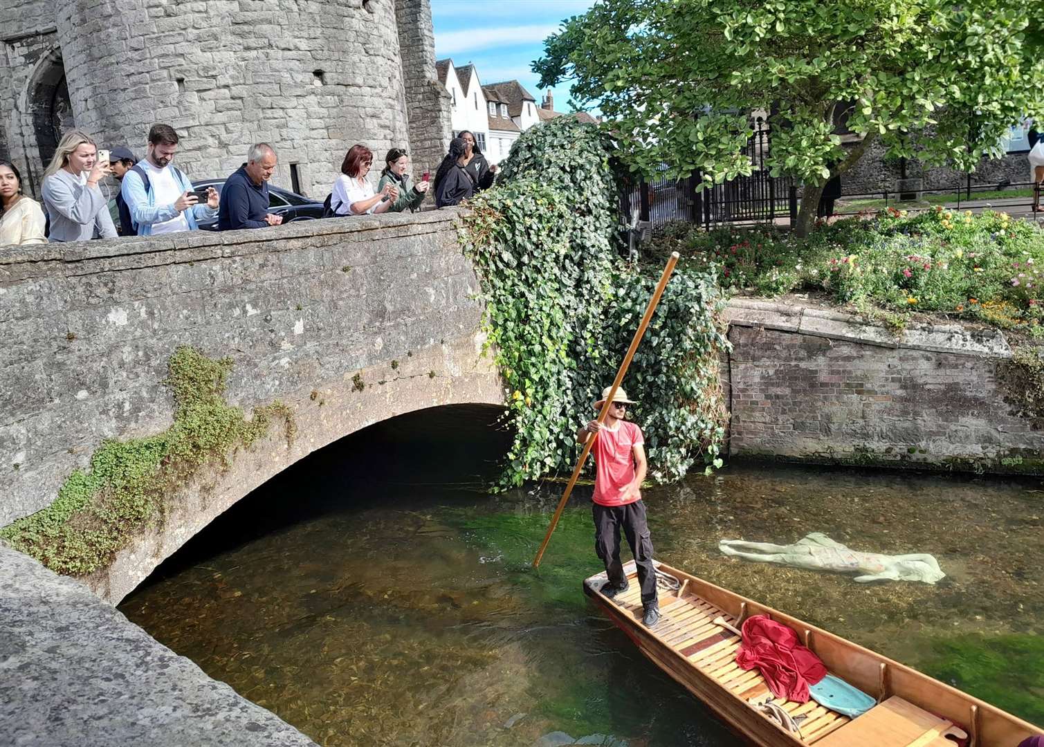 The new but controversial Alluvia statue in the Stour by the Westgate Towers in Canterbury is an intriguing sight for visitors