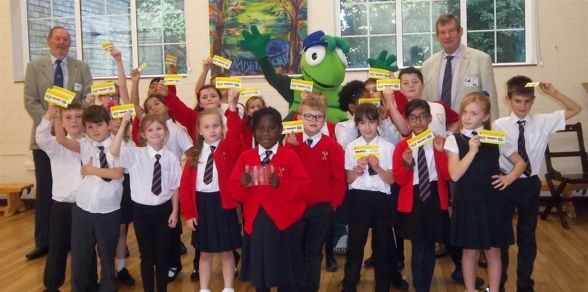 Westgate Bay Class with Roy Copper and Chris Burton from Rotary Club of Margate celebrate St Gregory's CP School joining Buster's Book Club.