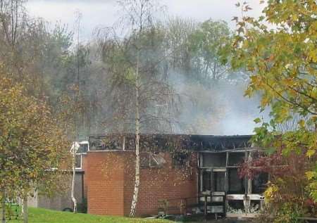 The smouldering remains of part of the building. Picture: GRAHAM RUSSELL