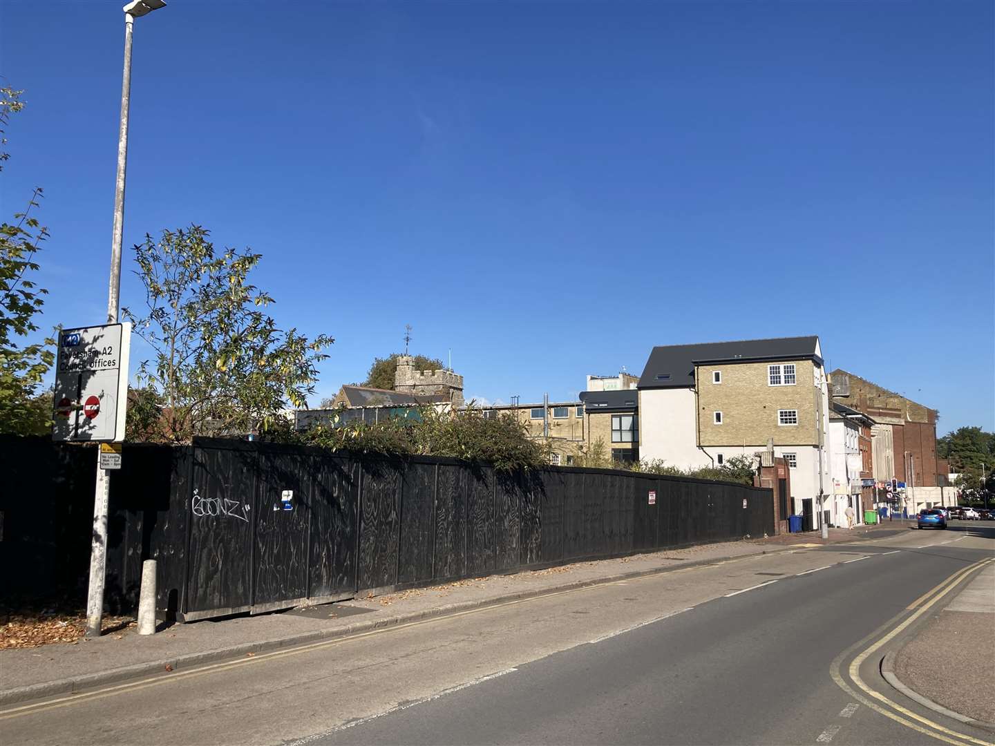 Hoardings in Bell Road, Sittingbourne, hide what is going on, or not, on the site of the former Bell shopping centre. Picture: John Nurden