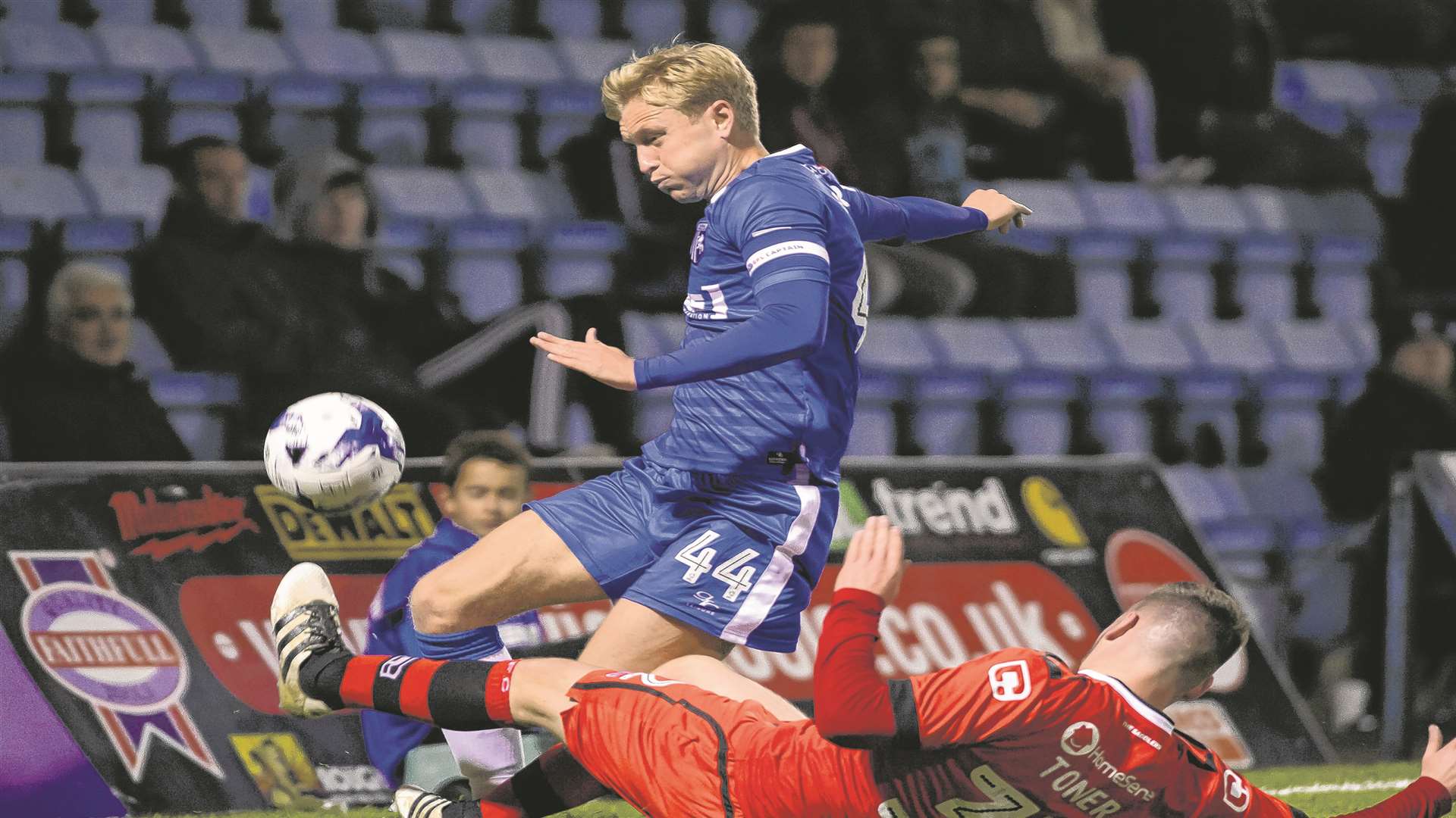 Gills skipper Josh Wright challenged by Kevin Toner Picture: Andy Payton