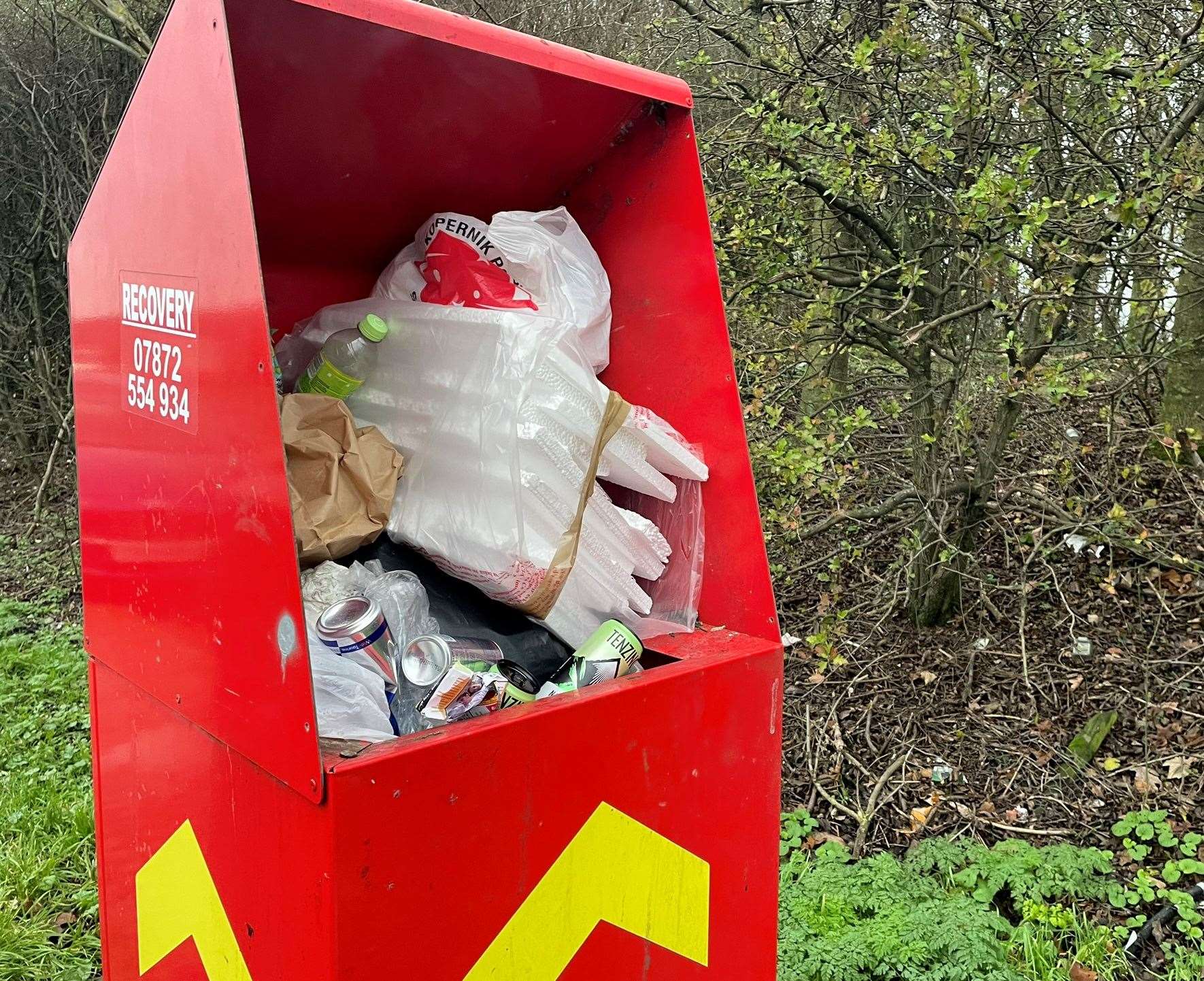 One of the two bins on the A249 lay-by overflowing