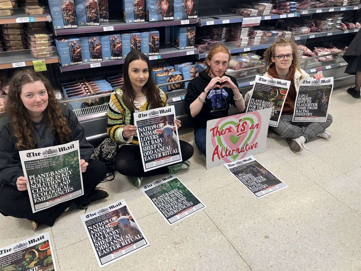 A group of four animal activists protested in two Kent supermarkets. Picture: Animal Rebellion