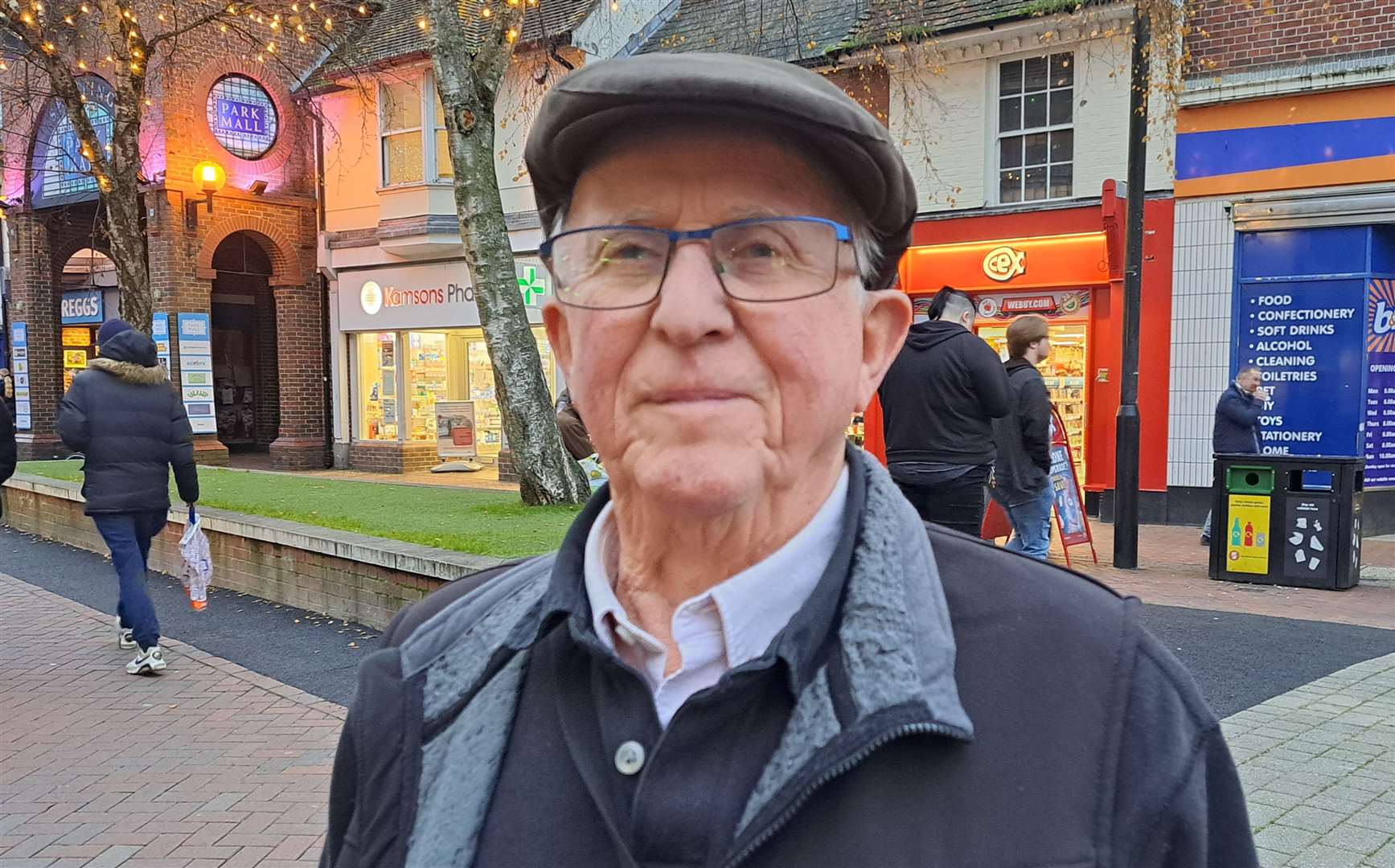 Ron Batchelor, pictured in Ashford High Street, sticks to paying by card